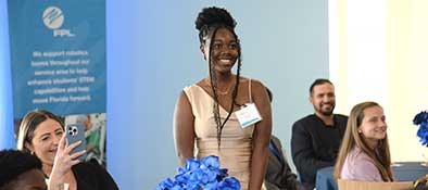 scholarship winner standing