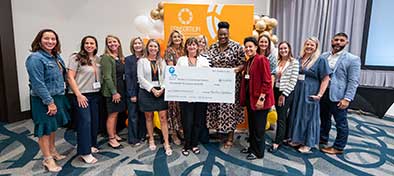 scholarship winner standing