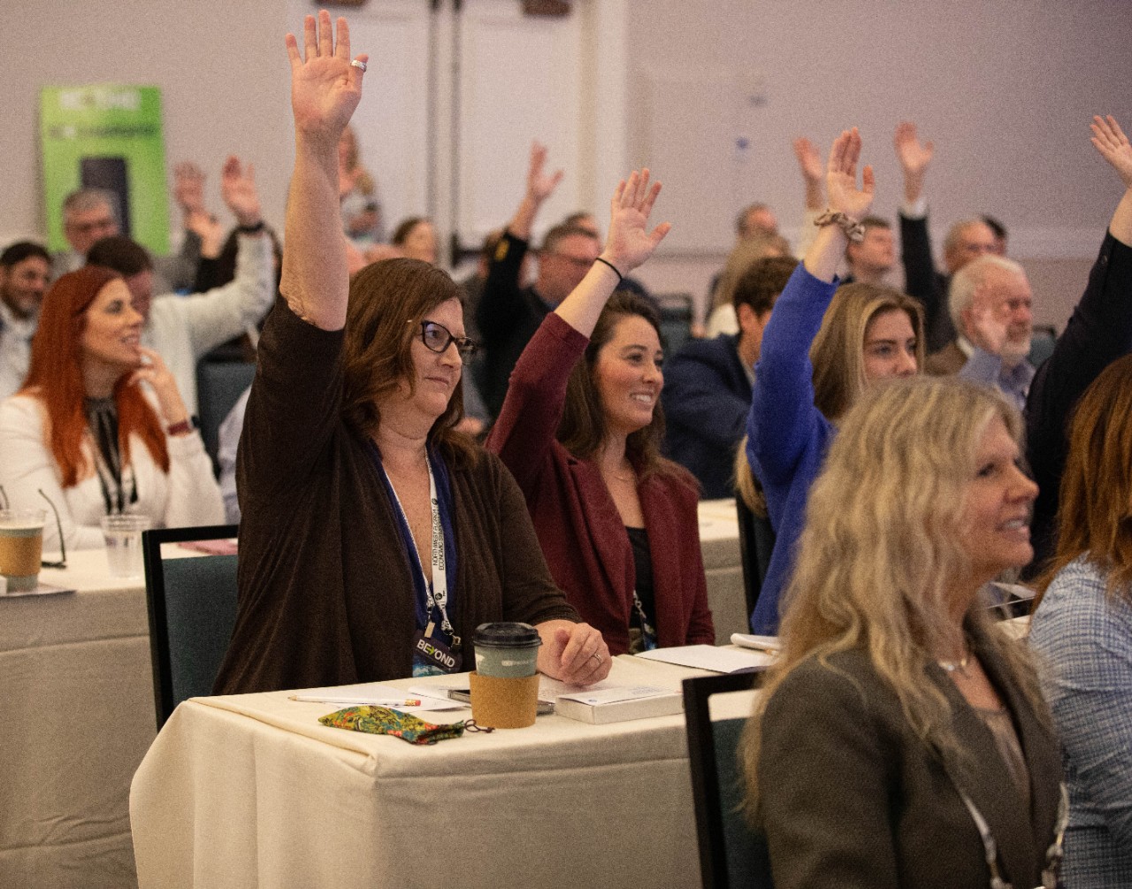 NWFL 2024 Symposium - audience members raising hands