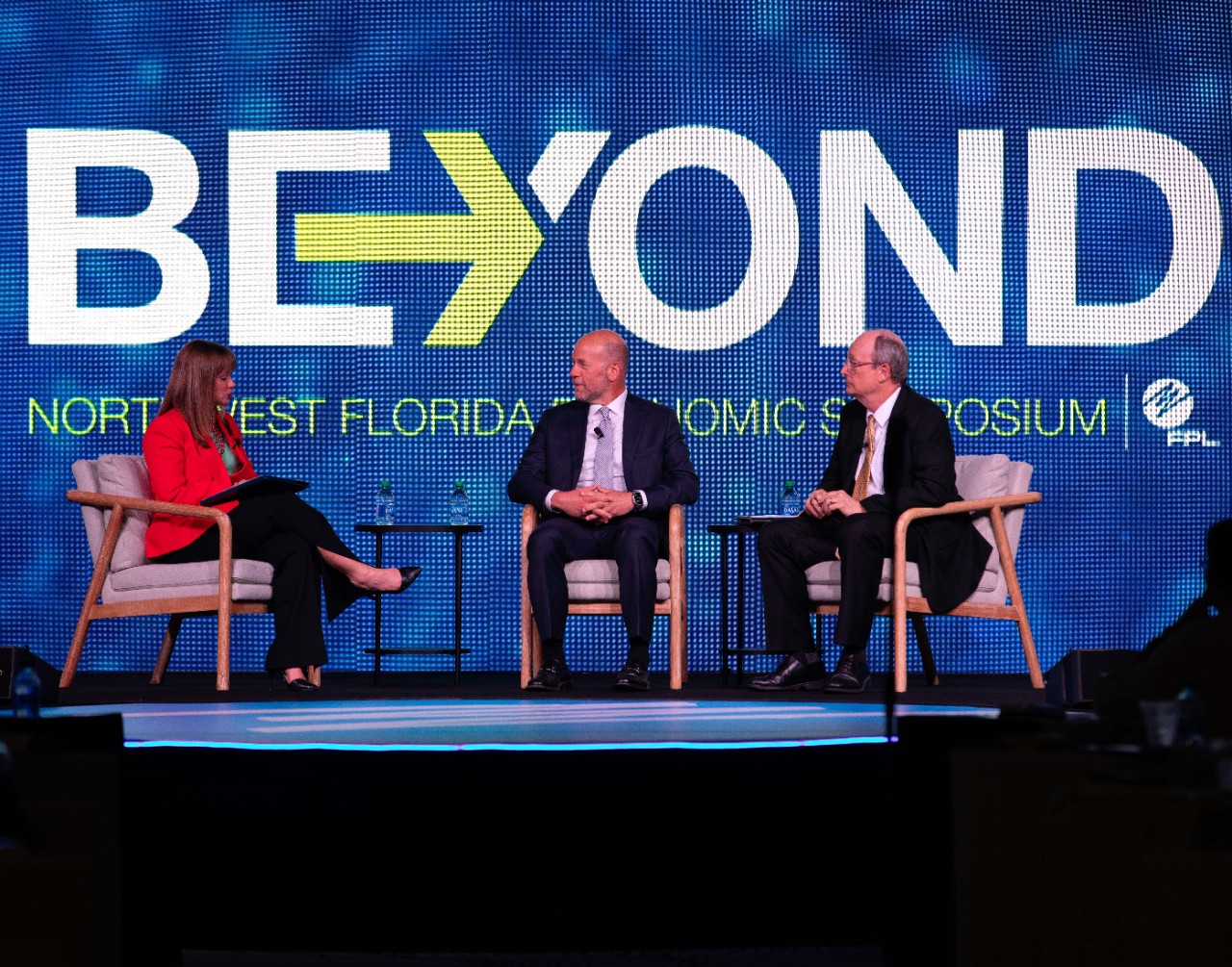 NWFL 2024 Symposium - speakers on stage