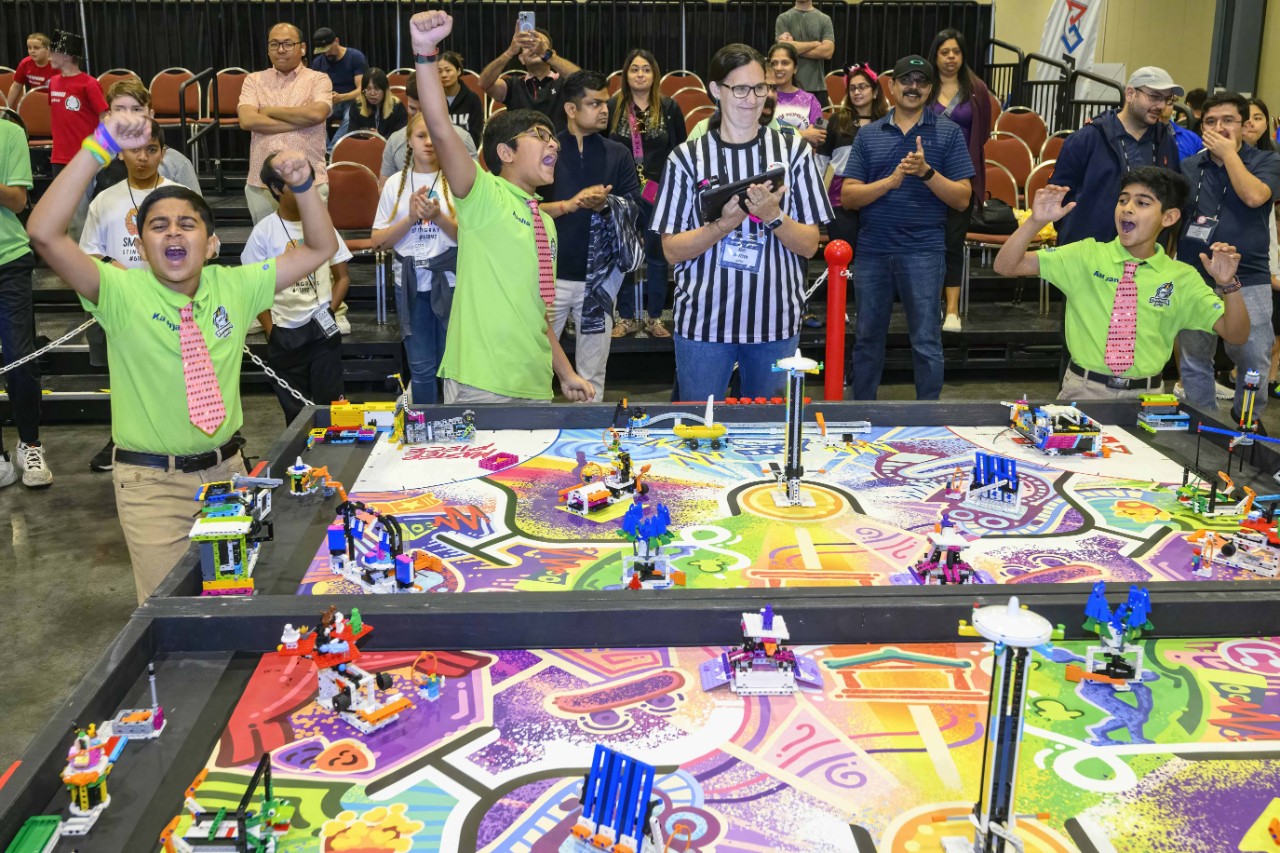 robotics team with students