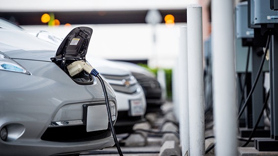 electric vehicle plugged into a charger