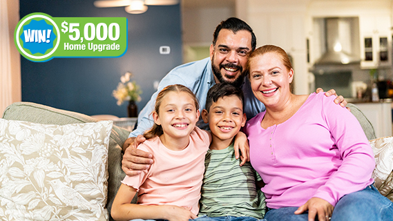 win $5000 home upgrade couple on couch touching hands