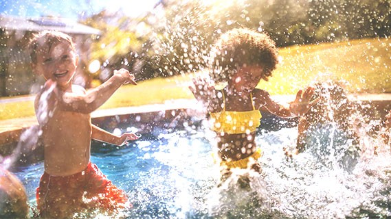 Kids splashing in the pool