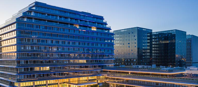 modern wide buildings with glass windows
