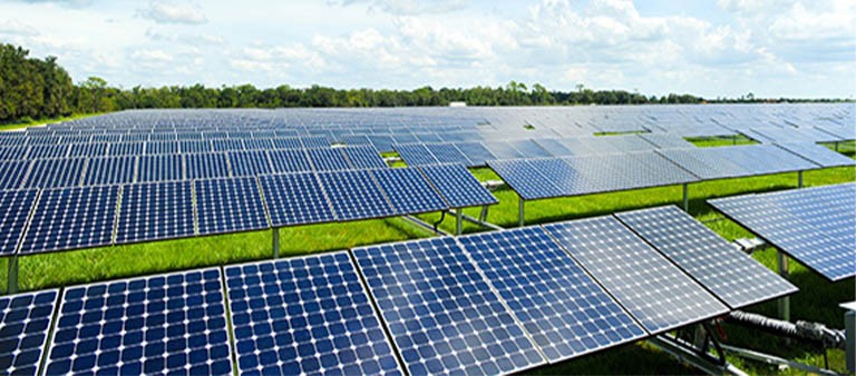 view of solar panels in a field
