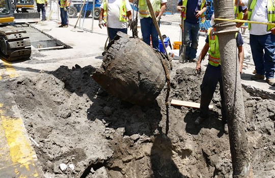 Crews working underground in downtown Pensacola