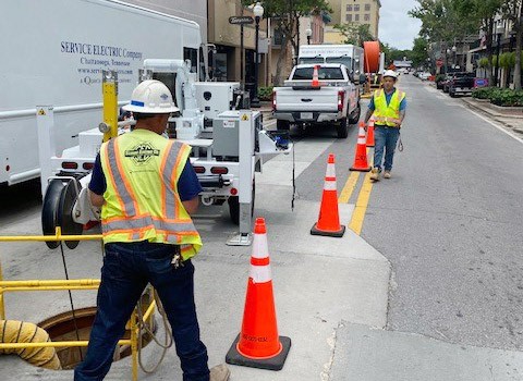 Crews working underground in downtown Pensacola