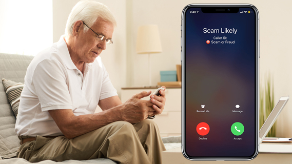 man holding phone with scam call