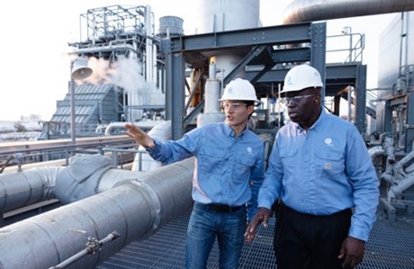 two men at industrial plant