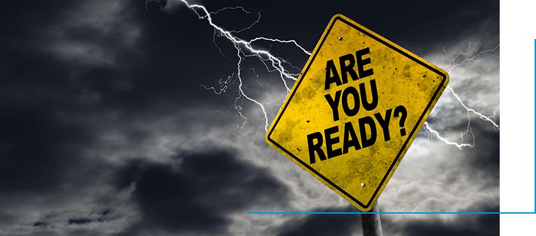 Are You Ready sign against a stormy background with lightning and copy space. Dirty and angled sign adds to the drama.