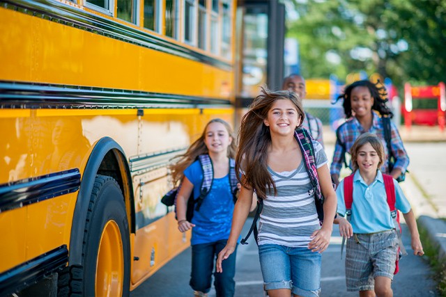 happy kids going to school