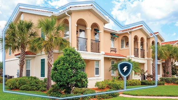 a two story home with a blue glow outline to depict surge protection