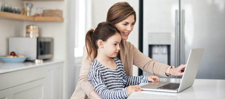 mother and daughter looking at FPLES surge protection 
