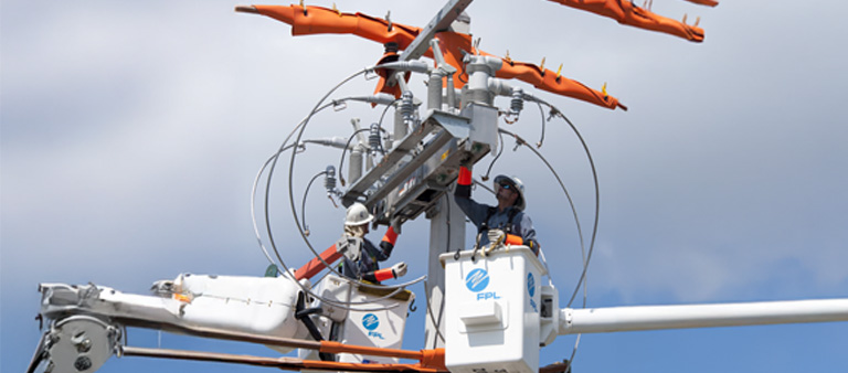 FPL employee on aerial lift working on smart grid