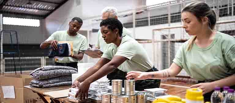 soldiers organizing donations at a gymnasium